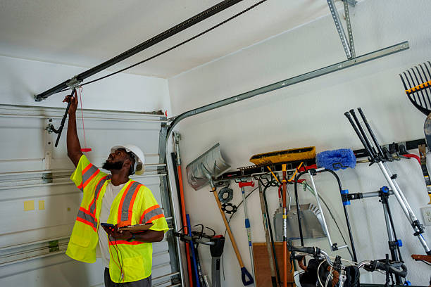 Professional Garage Door Panel Replacement technician working in Slinger, WI